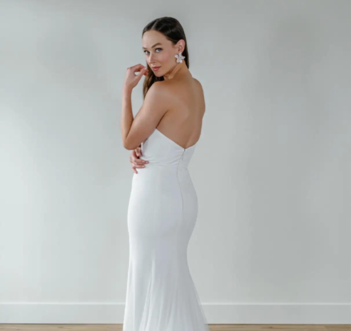Model wearing a Fit to Flare gown