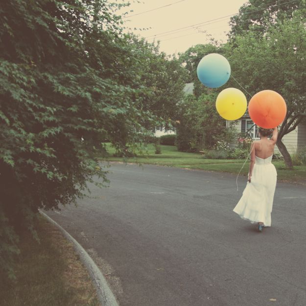 hol walking with balloons