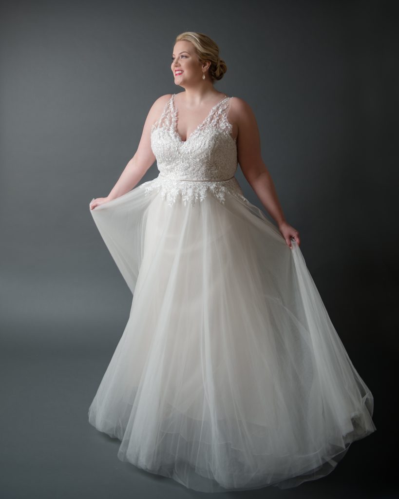 Introducing | Full Figured Bridal at The White Dress by the shore. Desktop Image