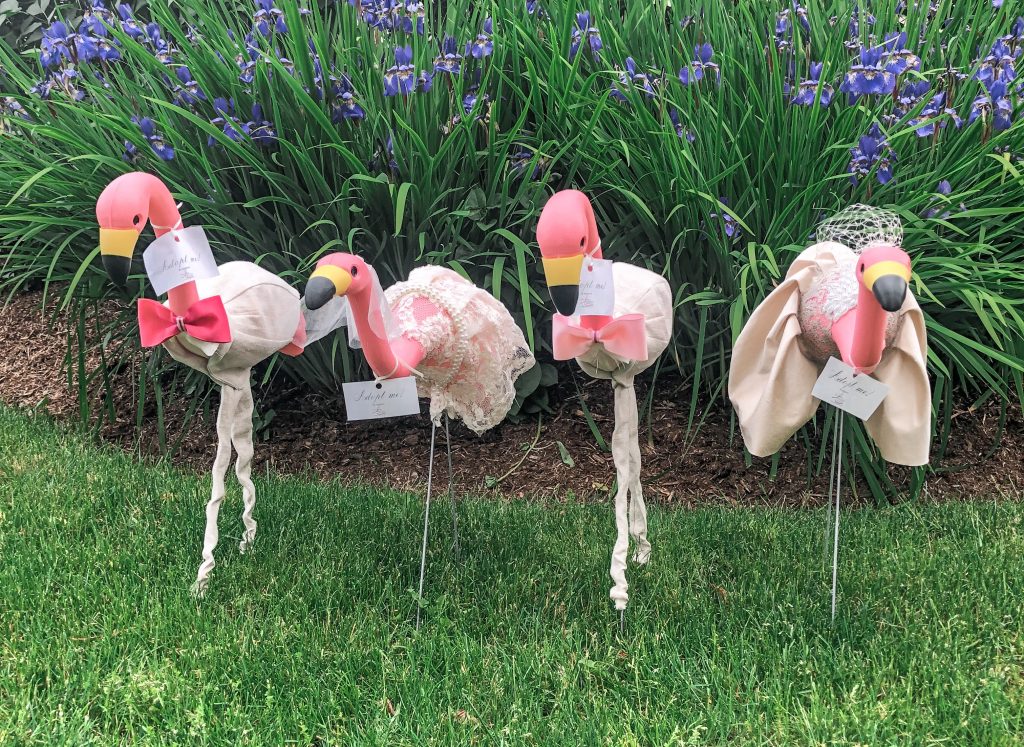 All four wedding lawn flamingos