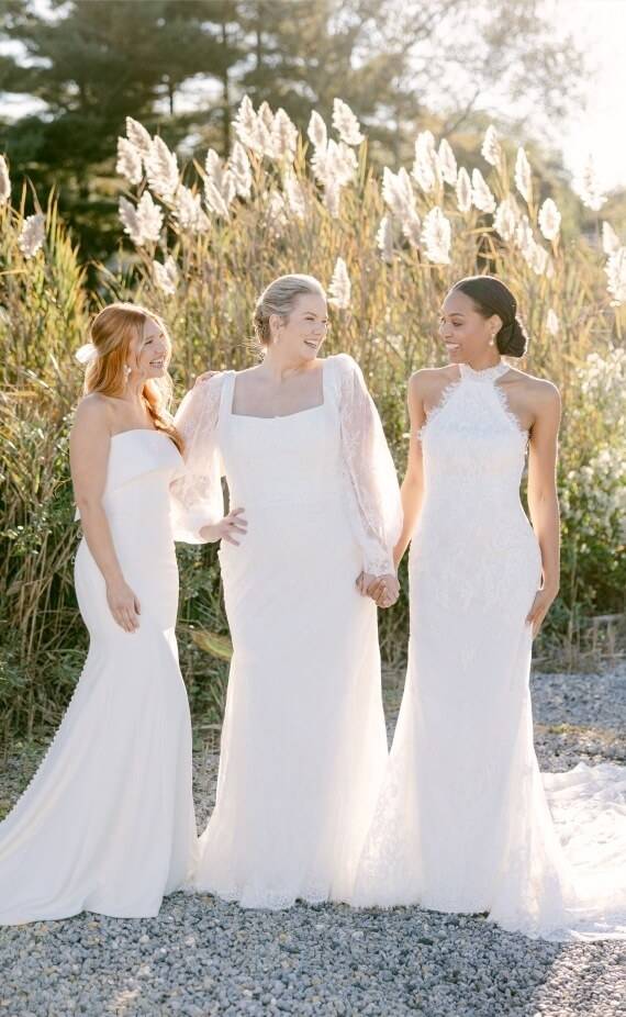 Models wearing a white dresses