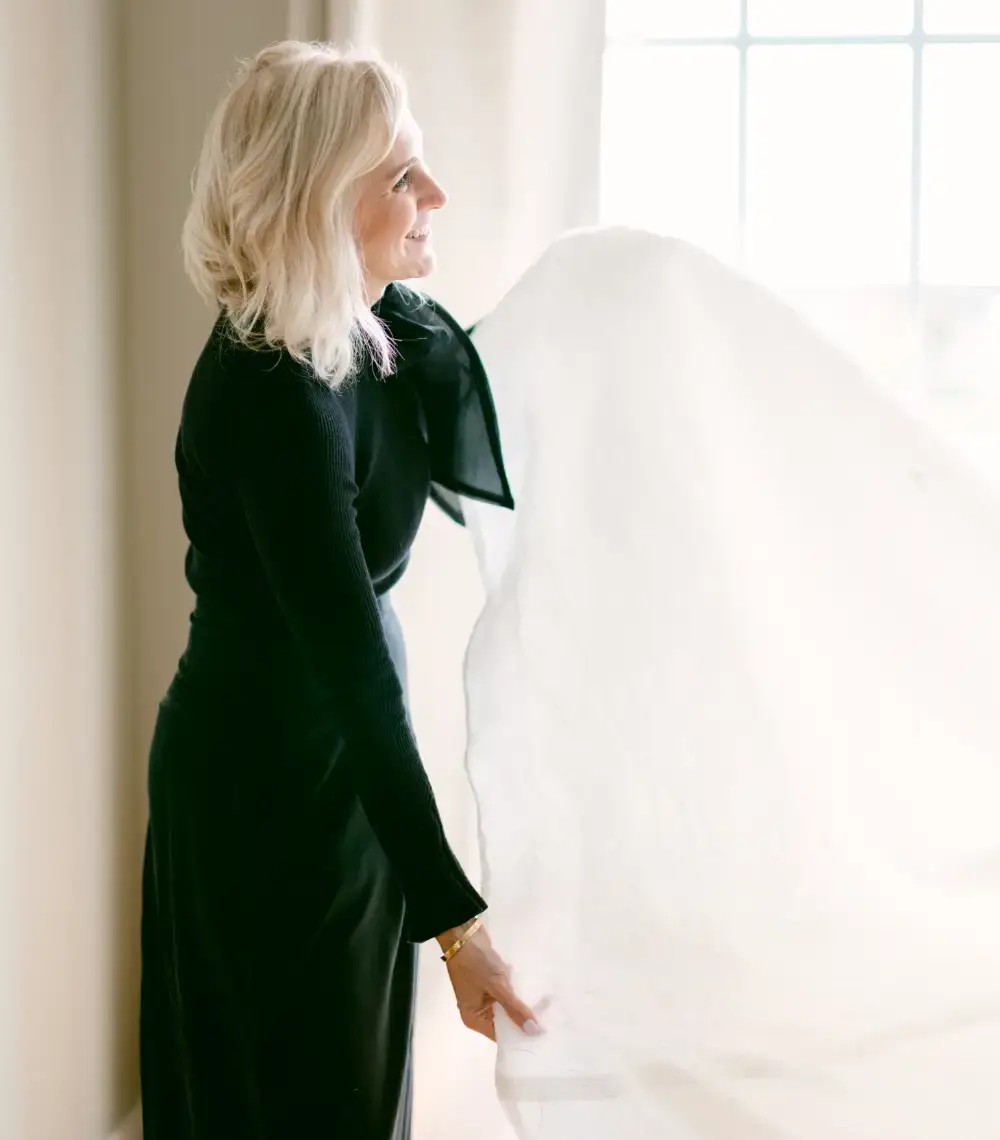 Model wearing a bridal white gown