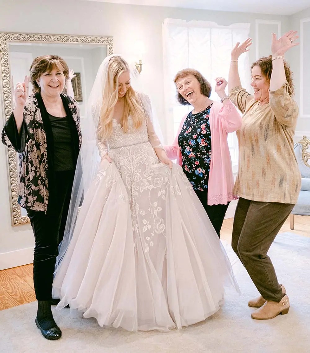 Model wearing a bridal white gown