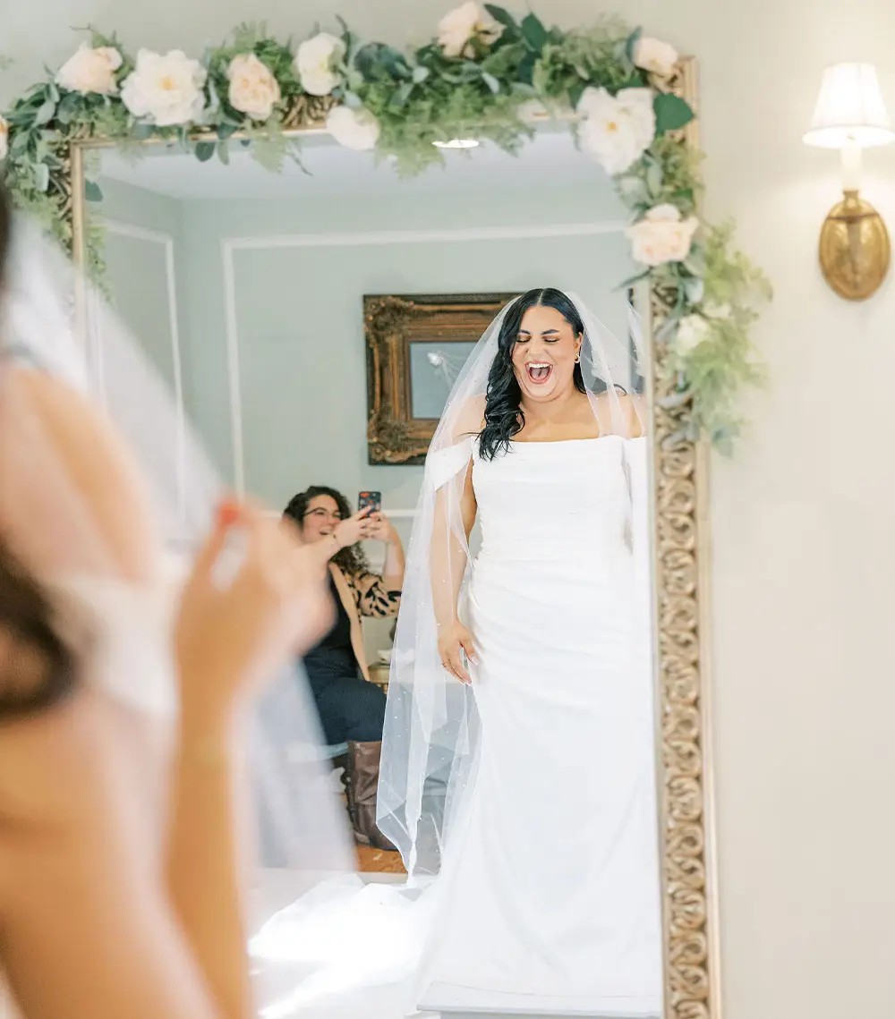 Model wearing a bridal white gown